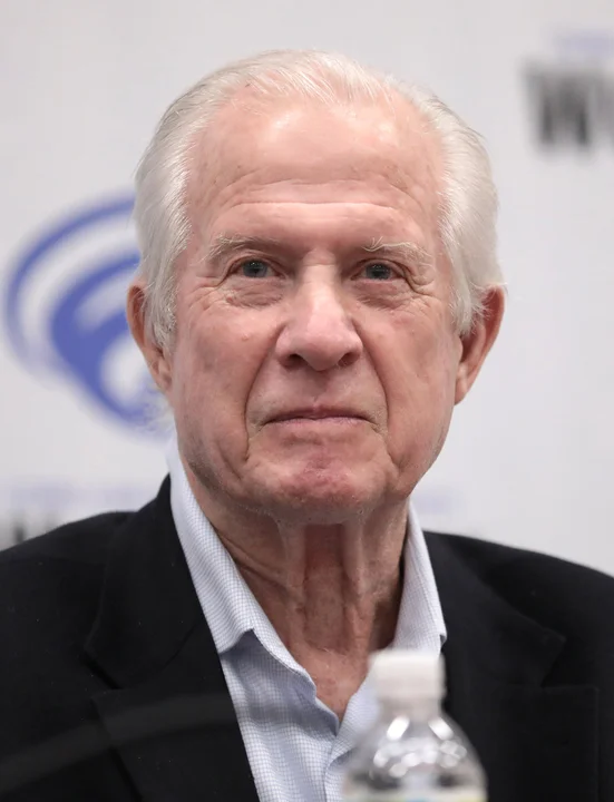 Tom Kalinske speaking at a convention