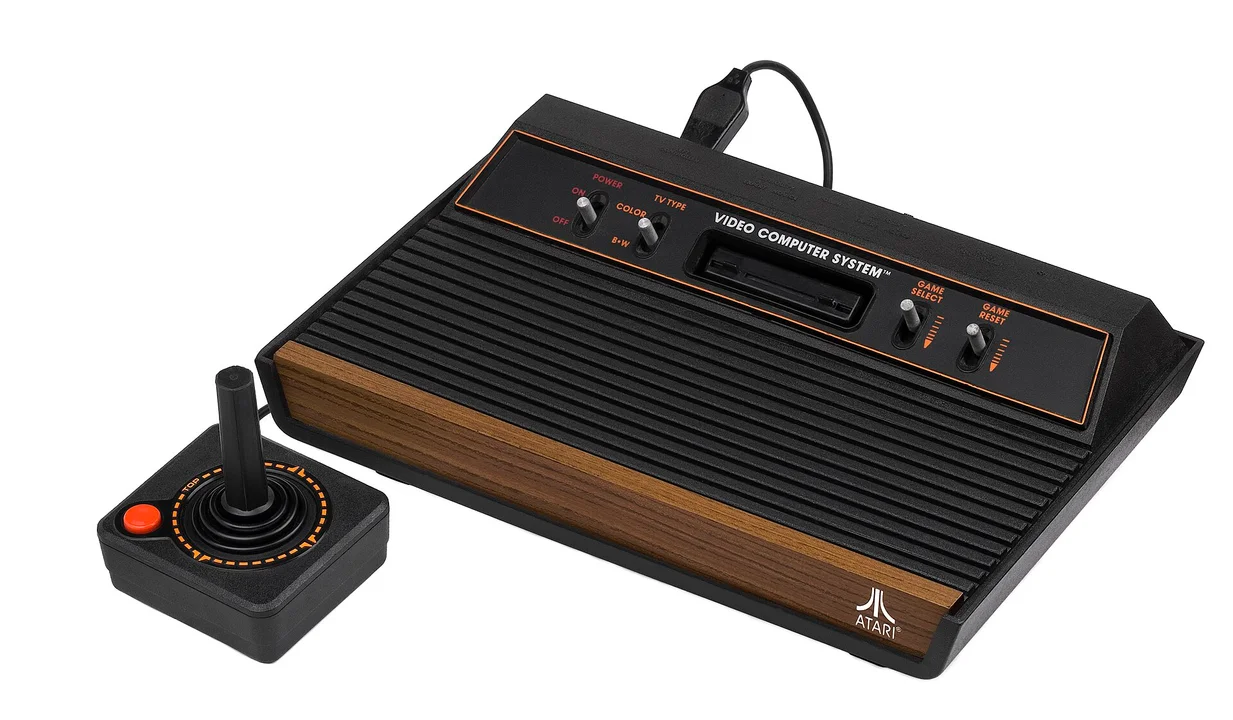 An Atari 2600 console with its CX40 joystick plugged in