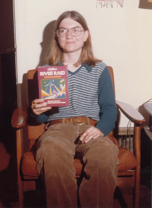 Carol Shaw holding the box for River Raid in 1982